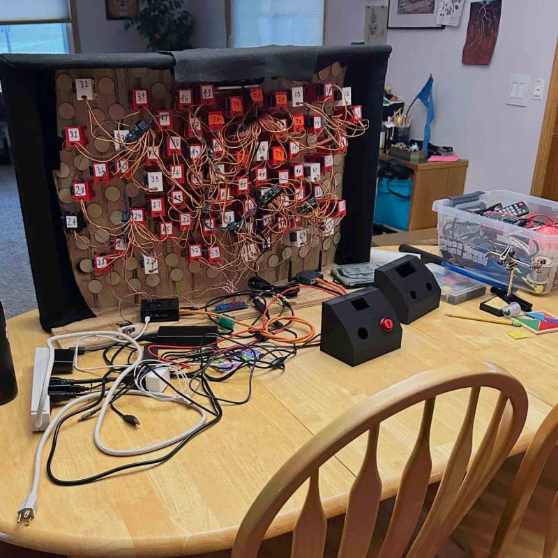 An eye looking through a magnifying glass at a computer screen